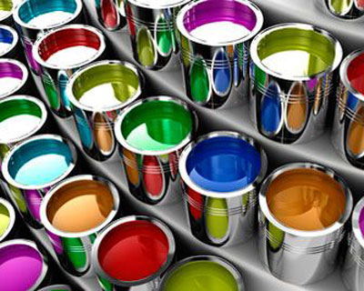 multiple silver buckets holding different colors of enamel spray paint