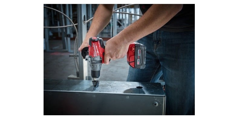 A man working with 2704-20 Milwaukee tool
