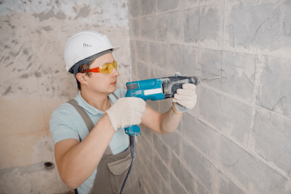 How to use a hammer drill and mark holes for drilling